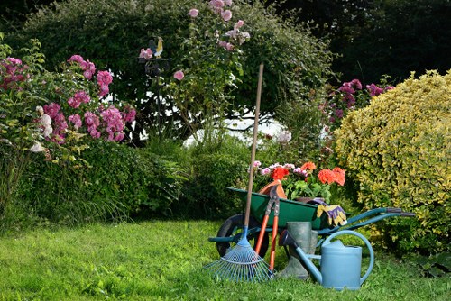 Gardeners working on a well-kept Homerton garden